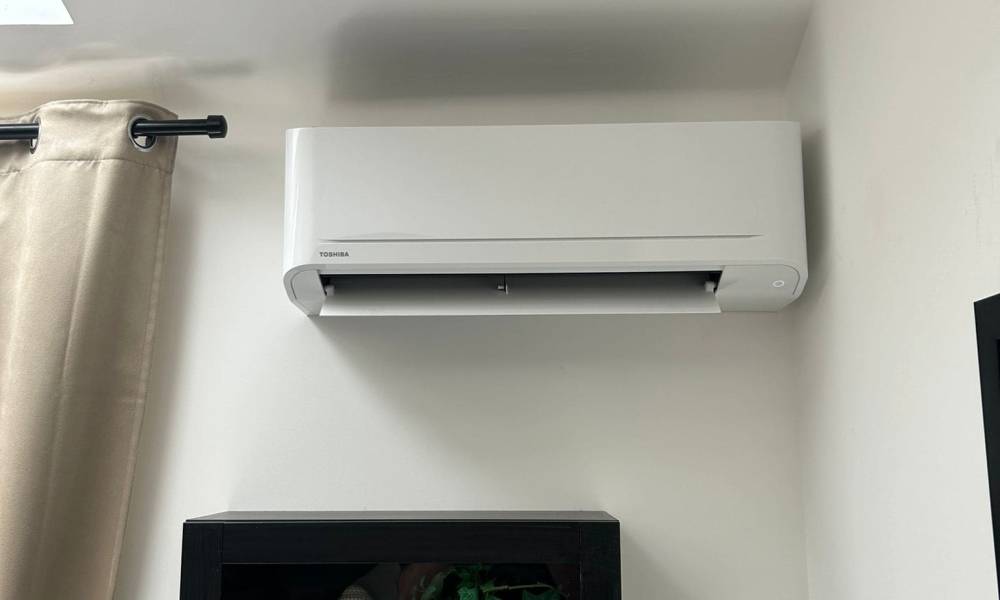 a white air conditioner on a wall